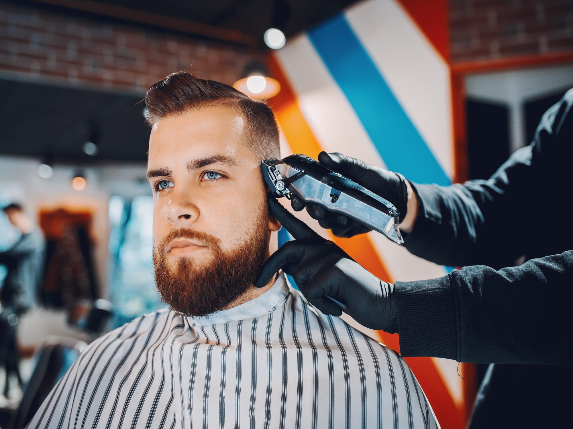 Barbershop avec 3 places de coiffure à vendre à Bussigny